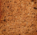 Cut of dark rye bread closeup Royalty Free Stock Photo