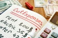 Cut Expenses for monthly home budget. Note and calculator Royalty Free Stock Photo