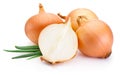 Cut fresh bulbs of onion on white background