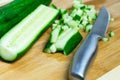 Cut a fresh cucumber to prepare different dishes.