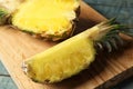 Cut fresh juicy pineapple on wooden board Royalty Free Stock Photo