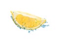 Cut fresh lemon and splashing water on white background Royalty Free Stock Photo