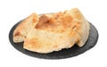 Cut fresh pita bread with slate plate on white background Royalty Free Stock Photo