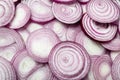 Cut fresh red onions as background, top Royalty Free Stock Photo