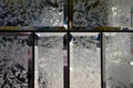 Cut glass panels of old doors. the edges of the glass tables are smooth and the center is in the pattern of frozen ice flowers and