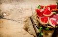 The cut grapefruit with leaves Royalty Free Stock Photo