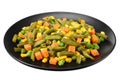 Cut green beans, green peas and corn at black plate isolated on white background. healthy food Royalty Free Stock Photo