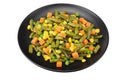 cut green beans, green peas and corn at black plate isolated on white background. healthy food Royalty Free Stock Photo