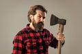 cut hair with ax. male hairdresser or barbershop. brutal butcher in shirt. lumberjack ready to work in forest. confident Royalty Free Stock Photo