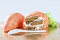 Cut in half delicious cake in the form of carrots closeup Royalty Free Stock Photo