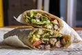 Cut indian wrap with chicken meat and garam masala