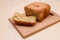 A cut loaf of homemade multi-slag bread on a Board
