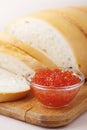 Cut loaf of white bread and caviar Royalty Free Stock Photo