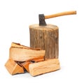 Cut logs fire wood and old axe. Royalty Free Stock Photo