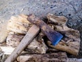 Cut logs firewood and old axe Royalty Free Stock Photo