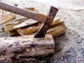 Cut logs firewood and old axe Royalty Free Stock Photo