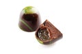 Cut luxury handmade bonbon with chocolate ganache and fruit jell Royalty Free Stock Photo