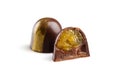 Cut luxury handmade bonbons with chocolate ganache and citrus fr Royalty Free Stock Photo