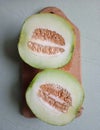 cut melon in half Royalty Free Stock Photo
