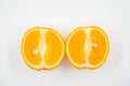 Cut orange close up on white background isolated Royalty Free Stock Photo