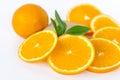 Cut orange on a white background. Natural orange fruit with cut slices. Vitamin C