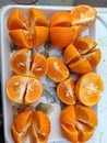 Cut oranges citrus placed in a dish