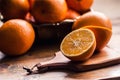 Cut oranges. Pressed orange manual method. Oranges and sliced oranges with juice and squeezer. Royalty Free Stock Photo