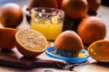 Cut oranges. Pressed orange manual method. Oranges and sliced oranges with juice and squeezer. Royalty Free Stock Photo