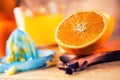 Cut oranges. Pressed orange manual method. Oranges and sliced oranges with juice and squeezer. Royalty Free Stock Photo