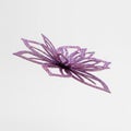 Cut-out flower shape from glitter paper, floating in mid air horizontally, on solid white background Royalty Free Stock Photo