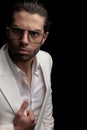 cut out picture of sexy fashion man holding white jacket suit Royalty Free Stock Photo