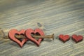 Cut out wooden heart shapes with rusted nail Royalty Free Stock Photo