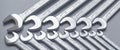Cut-out wrenches horizontally placed from the biggest to the smallest in a row. Top view composition. Hand tool.Banner.