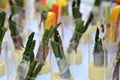 Buffet table with cut vegetable hors d`oeuvres on a white tablecloth