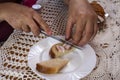 cut a piece of bread with bacon on a white plate. snack. Royalty Free Stock Photo