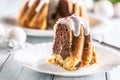 A cut piece of Easter marble cake on a white plate