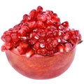 Cut the pomegranate with scattered grain isolated Royalty Free Stock Photo