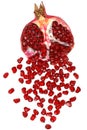 Cut the pomegranate with scattered grain Royalty Free Stock Photo