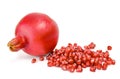 Cut the pomegranate with scattered grain top view on white background cutout Royalty Free Stock Photo