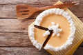 Cut pumpkin cheese cake close-up on the table. horizontal top vi Royalty Free Stock Photo