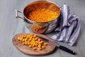 Cut the pumpkin into cubes on a cutting board and in a saucepan Royalty Free Stock Photo