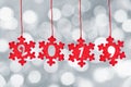 2019 cut in red fabric christmas ornaments hanging on bokeh background Royalty Free Stock Photo