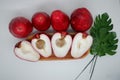 Cut ripe Malay apple or plumrose (jambu bol, jamaika) served on wooden tray Royalty Free Stock Photo