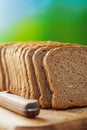 Cut rye bread and knife Royalty Free Stock Photo