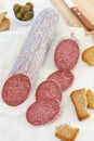 Cut salami with olives Royalty Free Stock Photo