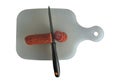 Cut sausage and knife on white background Royalty Free Stock Photo