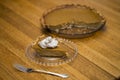 Cut Slice of Pumpkin Pie with Fork and Whipped Cream