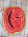 Cut a smiling watermelon