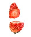 Cut strawberry in the air isolated on white background Royalty Free Stock Photo