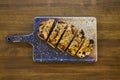 Cut toast of foie served on board